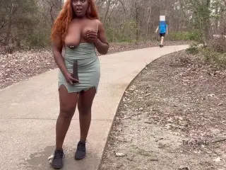 Naughty Girl Fucks and Sucks her Toy on a Busy Trail