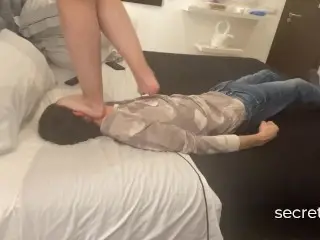 Barefeet Trampling on Bed