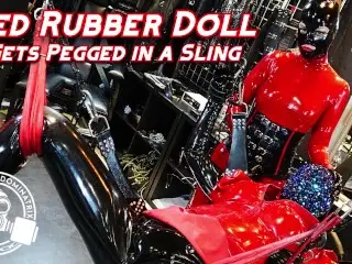 Red Rubber Doll Gets Pegged in Sling - Lady Bellatrix in Latex Catsuit with Strapon