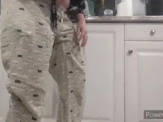 Desperate Wife Soaks Pants while doing Dishes