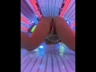 Thick MILF Gets Horny at the Tanning Salon, Masturbates and Squirts all over the Sunbed