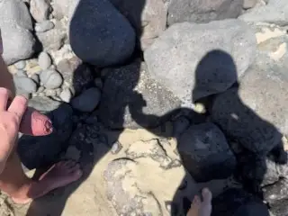 Girl Helps Stranger Piss and Touches Penis on Public Beach