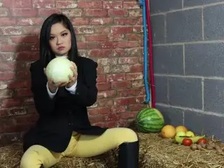 Equestrian Louisa Crushing Fruit Wearing Boots