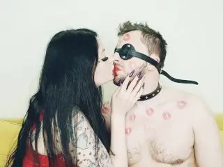 Kissing Fetish. Dominatrix Kisses her Beloved Slave and Leaves Lipstick Marks on his Body