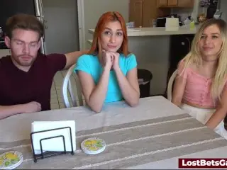 A Redhead and a Blonde Lose a Strip Game and Fuck the Male Winner