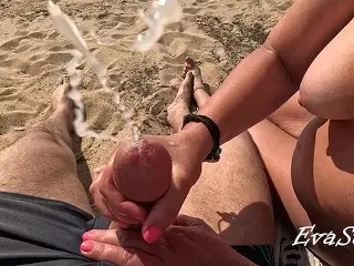 Handjob on a Public Beach by the Sea