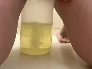 Huge Piss in Drinking Container