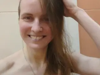 CUSTOM VIDEO WITH GOLDEN RAIN IN HOTEL SHOWER