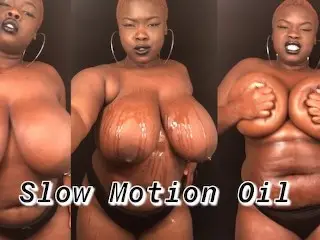 Slow Motion BBW Rubbing Oil on Big Natural Tits & Body