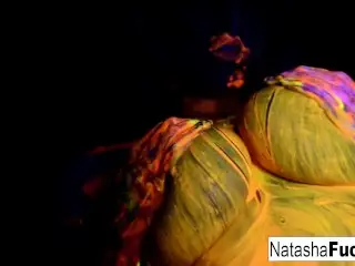 Busty Natasha Nice Shoots a Fun and Sexy Black Light Video