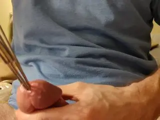 Removing Rosebud Sounds from a Swollen Cock