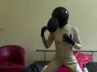 Latex Catsuit Girl Plays Breath Control with Rubber Ball Hood + Breath Bag