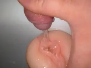 Teen Boy Piss in a Pocket Pussy