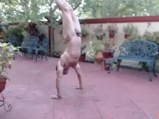 Sexy Guy Practicing Outdoor Handstand Naked