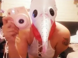 Plague Doctress Takes Nudes while Watching Porn