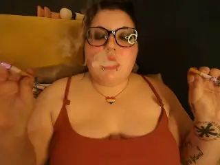 Chubby Hippie Sugar Dandy Smokes two Cigarettes at once