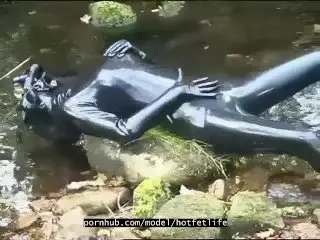 Outdoor Walk in the Wood and River Bath Full Encased in Black Latex Catsuit and Rubber Gas Mask