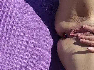 Alice is Relaxing on the Beach with a Plug in her Ass and then having Fun with her Favorite Vibrator