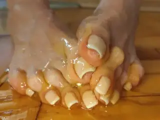 Wiggling Long Toes with French in Honey. Close up - Novem Olga