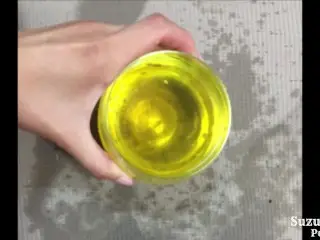 A Girl who Pees Beautifully in a Glass