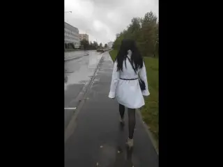 Sissy Walks on the Street in a new Coat