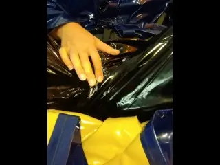 Solo Masturbation in PVC Raincoat and Latex