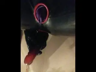 Horny Latex Hottie uses Toy