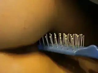 combing her pussy