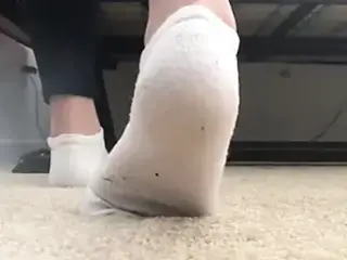 18 year old girl taking socks off