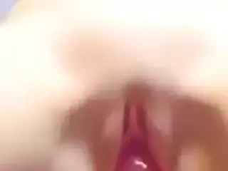 Busty masked girl rides a dildo