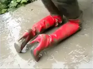 Sasja in muddy red thigh boots!!!