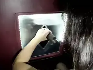 Brunette wife savors glory hole cocks