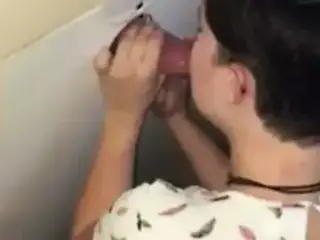 Slut servicing some glory hole strange