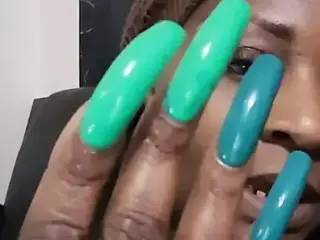 sexy black lady with awesome long nails fingernails