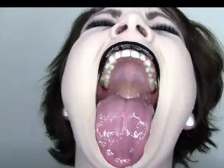 Glossy Black Lips and Dripping Wet Tongue Mouth Fetish