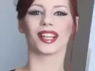 Sexy redhead smokes cork