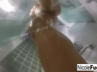 Pornstar Nicole Aniston takes a long steamy shower