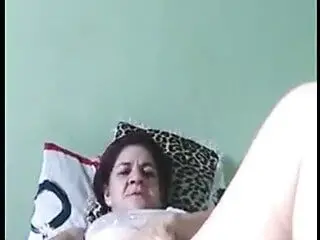 Brazilian mature playing with her dildo