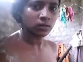 North indian housewife bathing