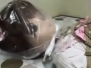 Kigurumi rope bondage and breathplay.