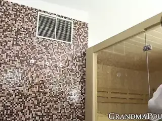 Slutty granny seduces innocent young man into shower sex