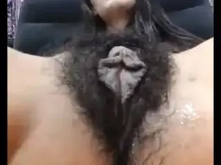 Mature very hairy cunt with long labia