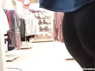 Round Ass Teen in Black Pants showing her thong at the mall