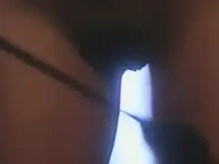 Girl spanked and sucks a strap on cock