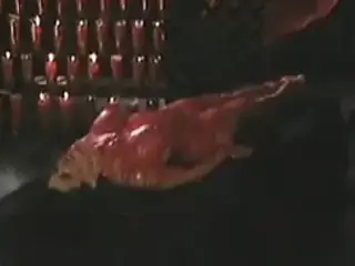 Fetish slut gets covered in hot wax
