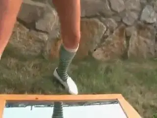 Becky is pissing on a mirror
