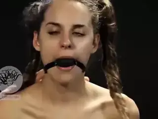 Teen girl with gagball ordered around