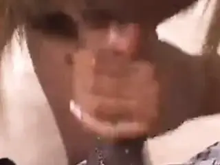 Small tits chick blowing a big black cock