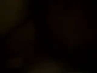 Holding cock in one hand and caring it