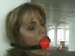 Hot blonde gets bounded and ball gag placed in her mouth